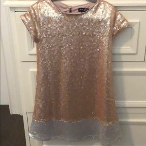Little girls sequined gold dress with silver hem